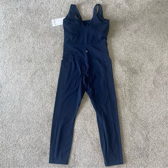Athleta Salutation Bodysuit in Navy 25” Size M One Piece Powervita Pockets NWT - Picture 8 of 10